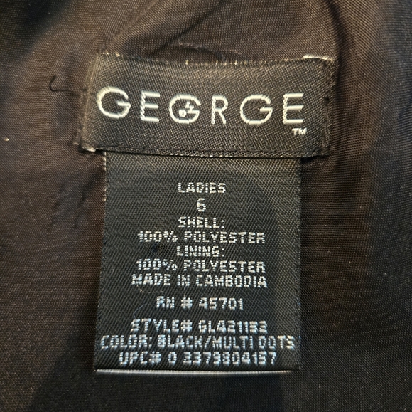 Very cute black skirt with multi colored dots on the sheer overlay. Size 6. - Picture 2 of 5